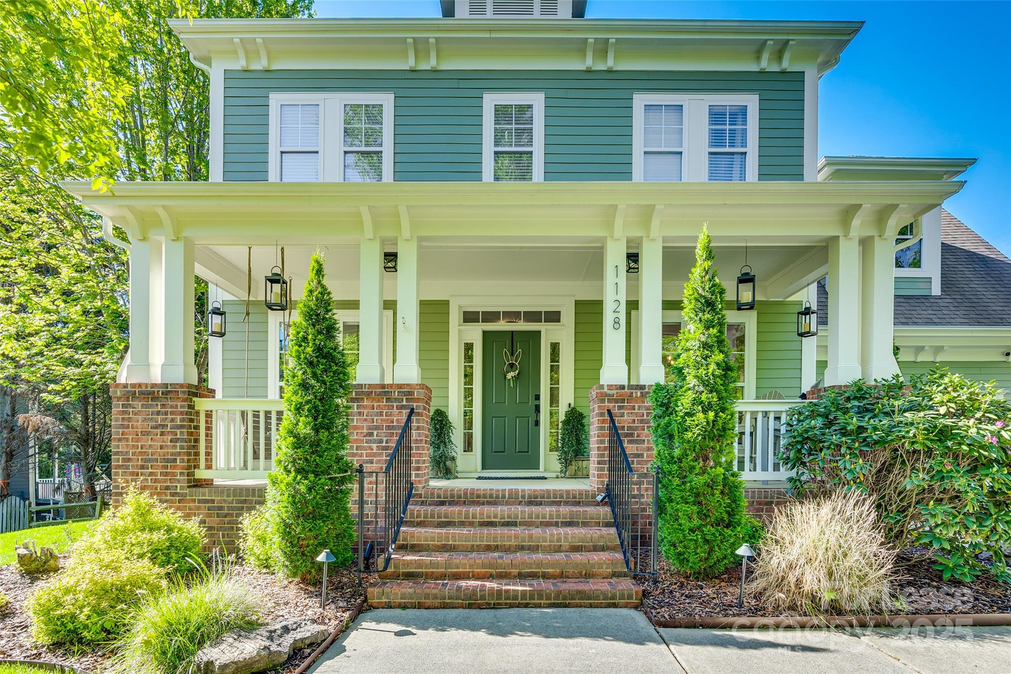1128 Windsong Bay Lane Fort Mill, SC 29708 - Photo 2 of 35 a front view of a house having garden
