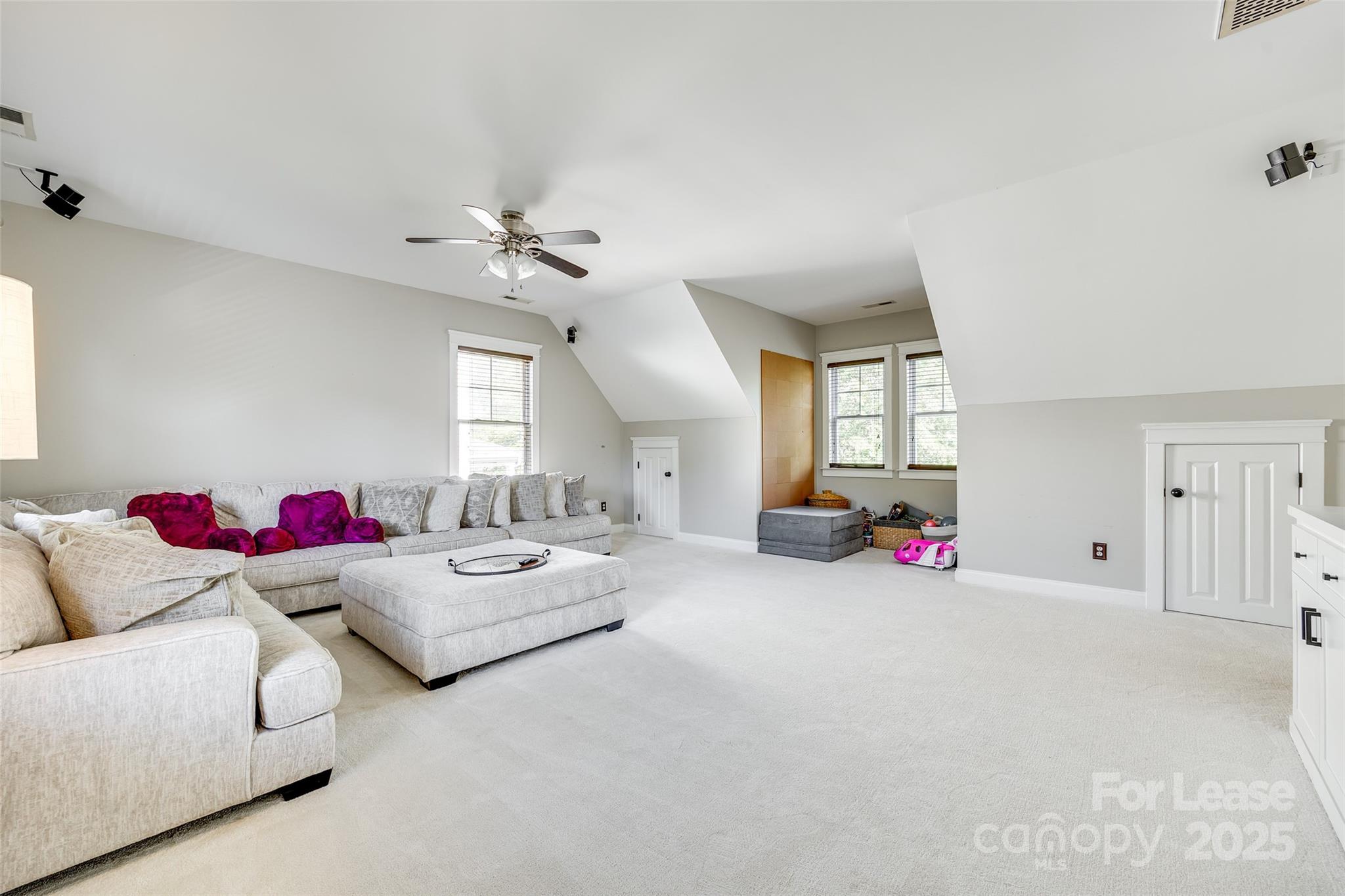 1128 Windsong Bay Lane Fort Mill, SC 29708 - Photo 27 of 35 a living room with furniture and white walls