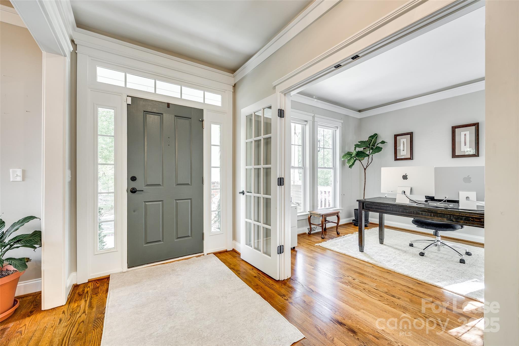 1128 Windsong Bay Lane Fort Mill, SC 29708 - Photo 3 of 35 a living room with furniture and a table