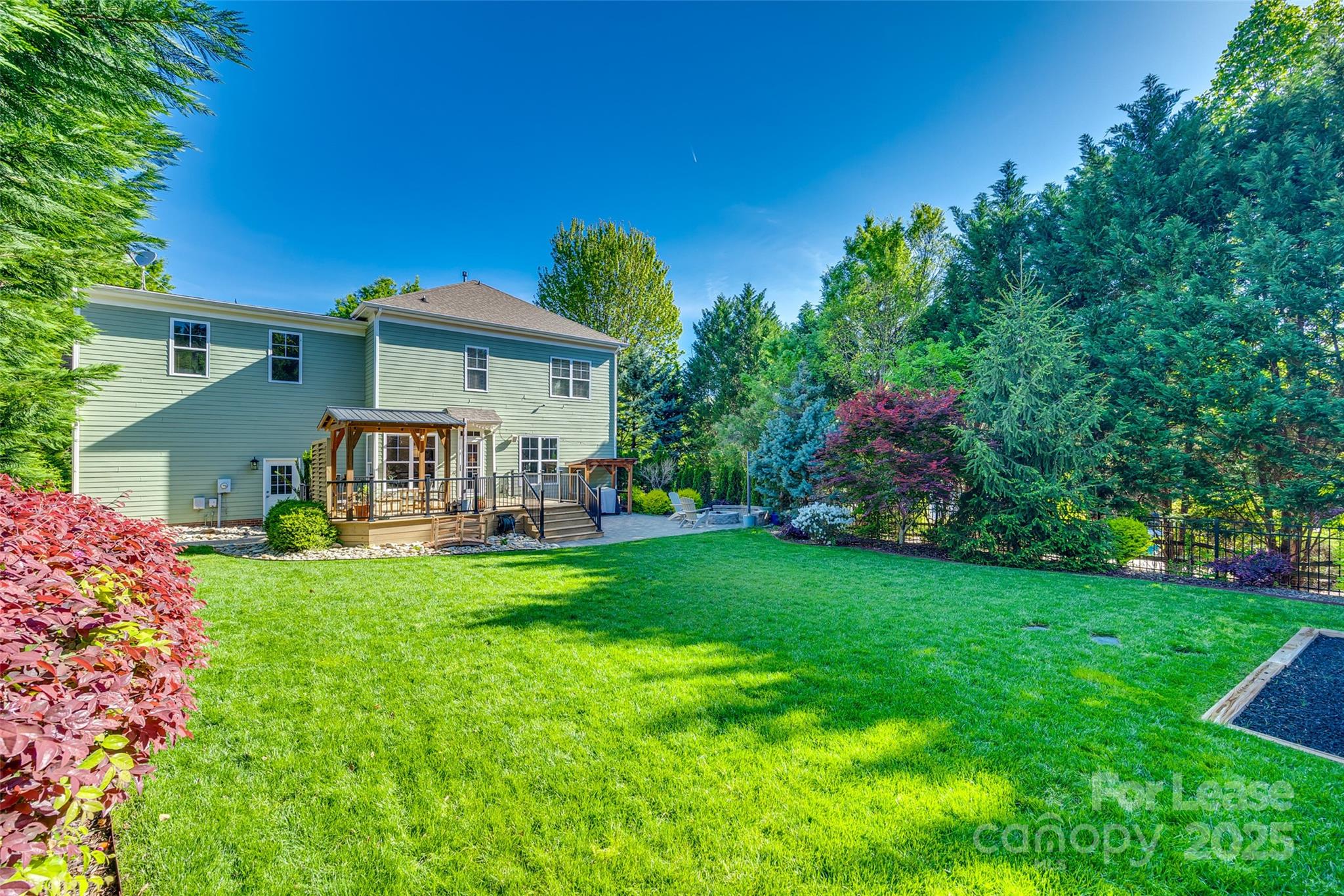 1128 Windsong Bay Lane Fort Mill, SC 29708 - Photo 33 of 35 a view of a house with a back yard