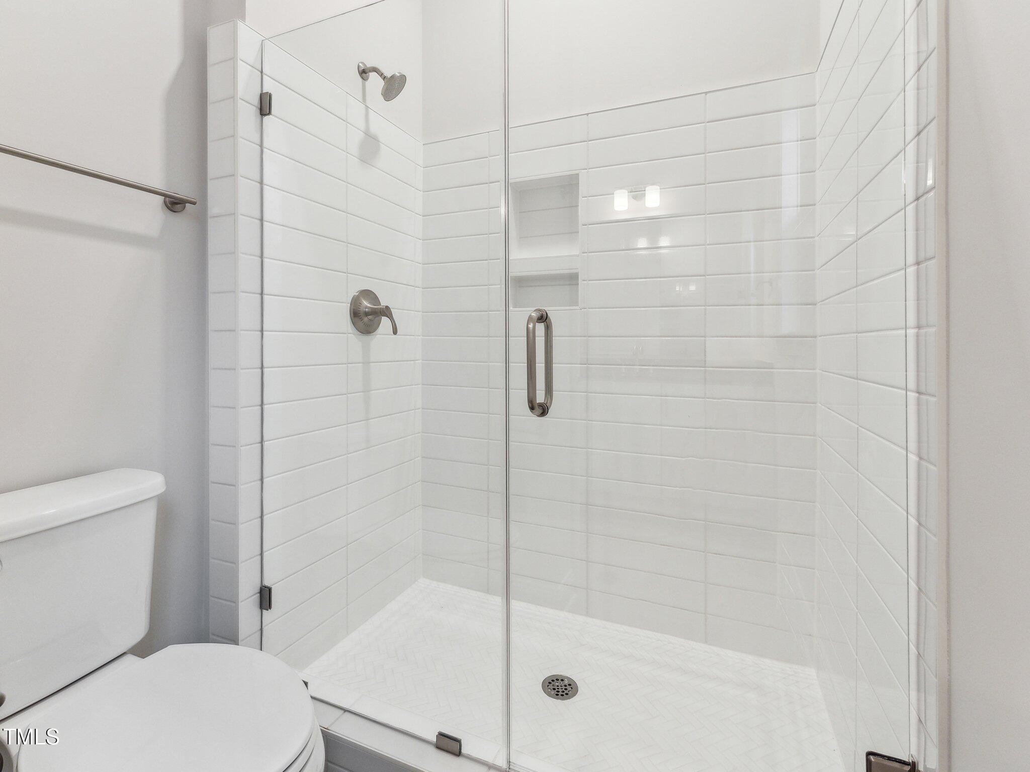 208 Regency Rdg Drive Holly Springs, NC 27540 - Photo 13 of 45 First floor bathroom with upgraded design features