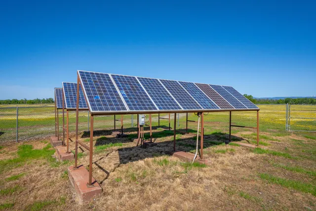 a view of a swimming pool with a lounge chair
