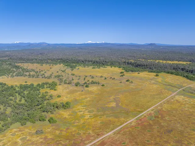 a view of an outdoor space and mountains