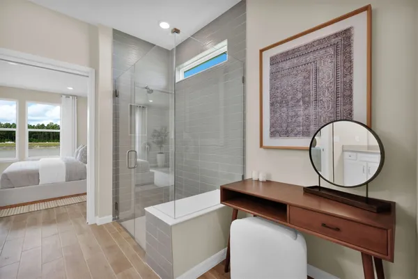 a bathroom with a double vanity sink and a mirror