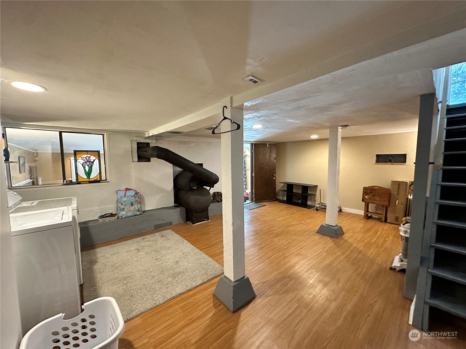 732 Gasman Road Port Angeles, WA 98362 - Photo 19 of 35 a view of a living room and a wooden floor