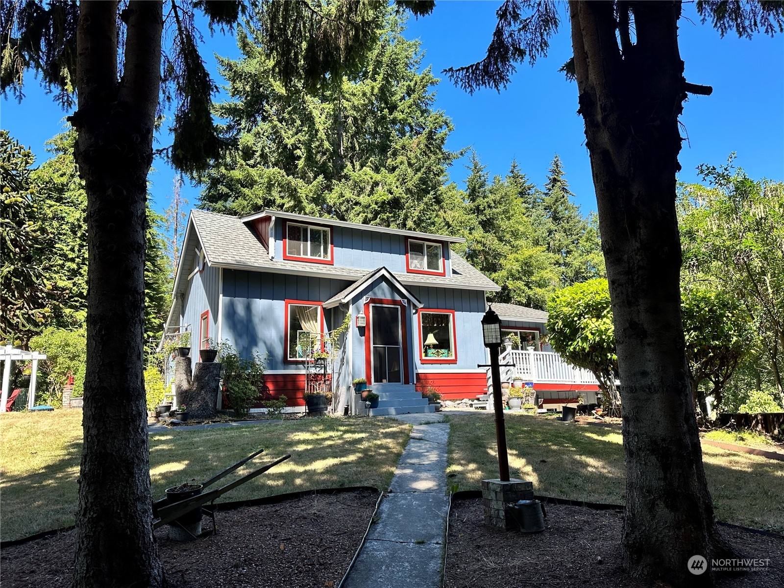 732 Gasman Road Port Angeles, WA 98362 - Photo 2 of 35 a front view of a house with garden