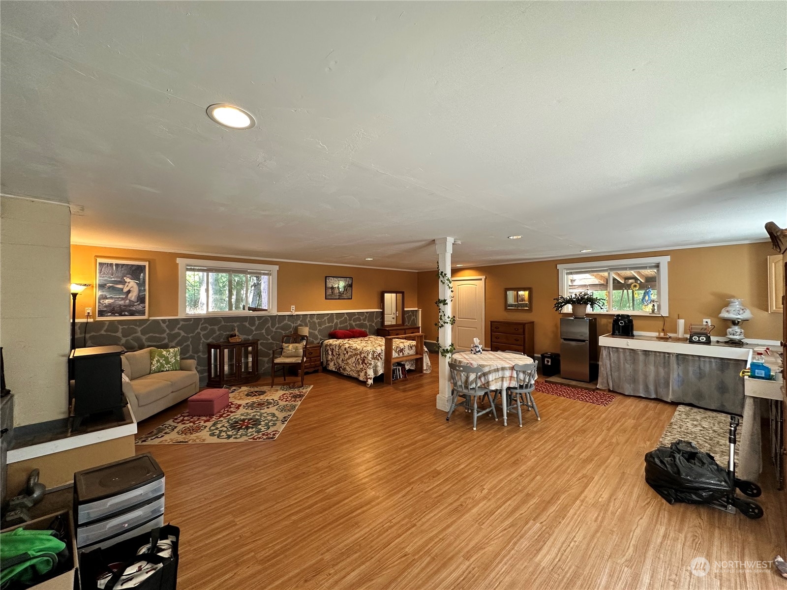 732 Gasman Road Port Angeles, WA 98362 - Photo 22 of 35 a living room with furniture and wooden floor