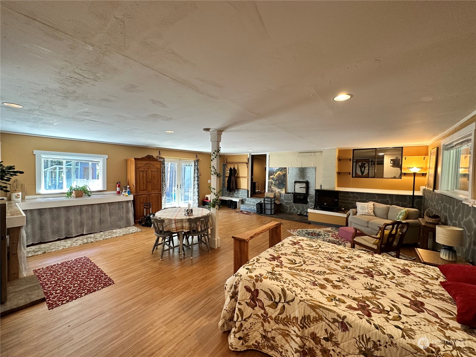732 Gasman Road Port Angeles, WA 98362 - Photo 24 of 35 a living room with furniture and a wooden floor