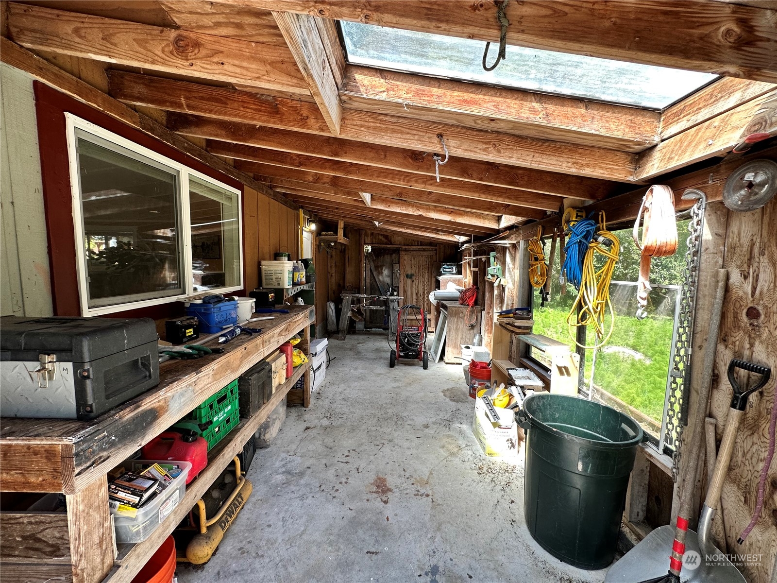 732 Gasman Road Port Angeles, WA 98362 - Photo 25 of 35 a storage room with a lot of stuff and washer