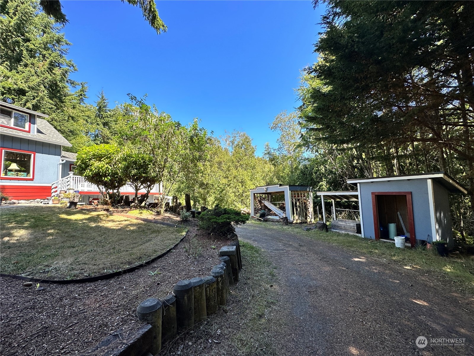732 Gasman Road Port Angeles, WA 98362 - Photo 28 of 35 a view of a dinning tables and chairs in the patio