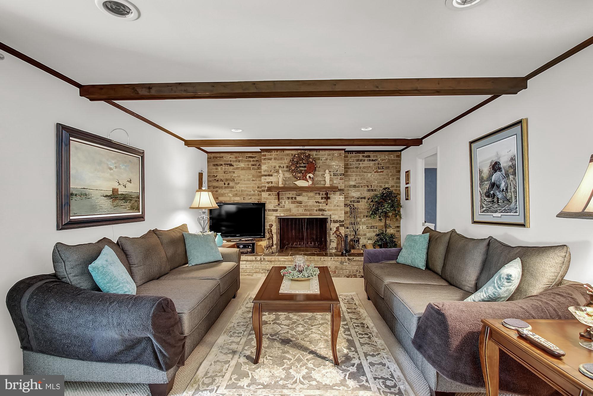 4237 4 Mills Road Baltimore, MD 21236 - Photo 15 of 24 FAMILY ROOM AND FIREPLACE