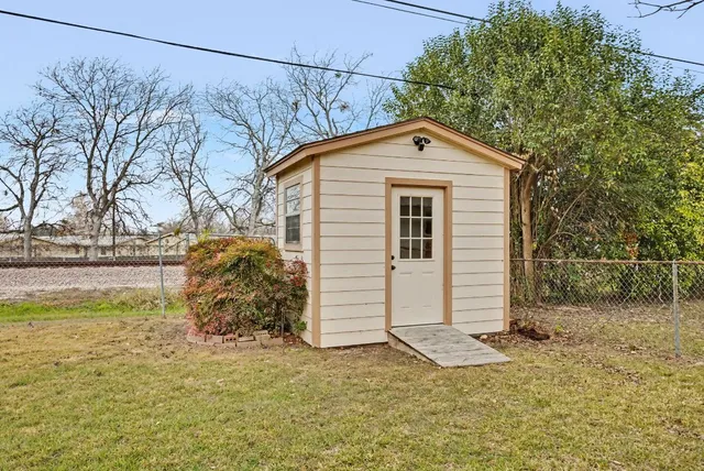 a front view of house with yard and seating area