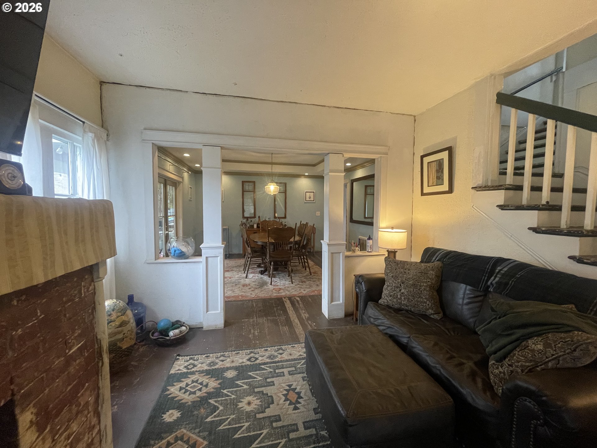 1006 5th Street Springfield, OR 97477 - Photo 24 of 43 a living room with furniture and a couch