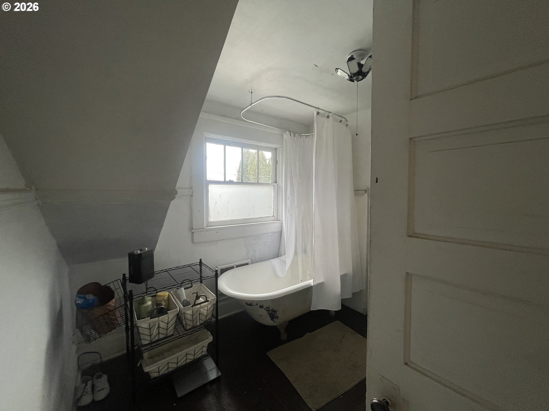 1006 5th Street Springfield, OR 97477 - Photo 35 of 43 a bathroom with a sink toilet and window