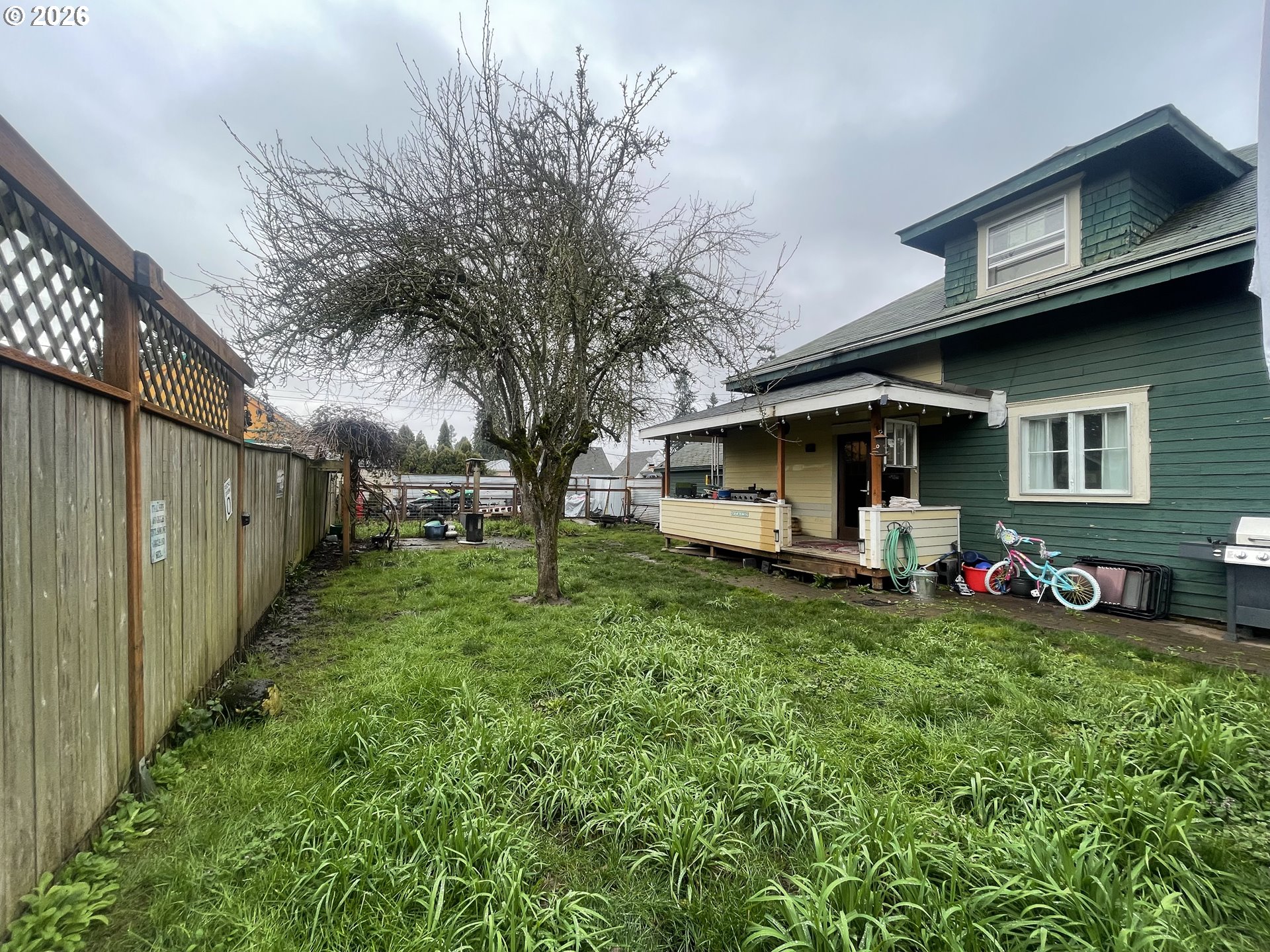 1006 5th Street Springfield, OR 97477 - Photo 39 of 43 a view of a house with backyard and sitting area