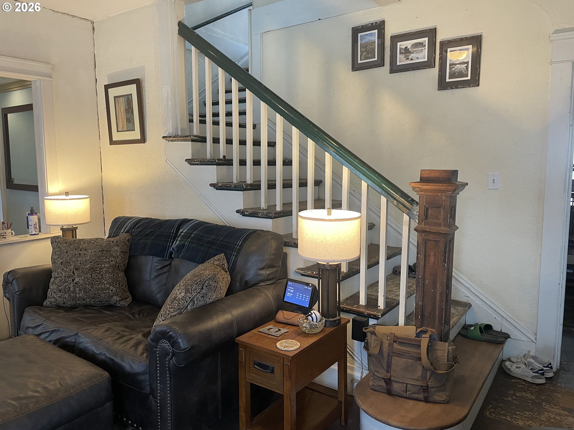 1006 5th Street Springfield, OR 97477 - Photo 6 of 43 a living room with furniture and a wooden floor