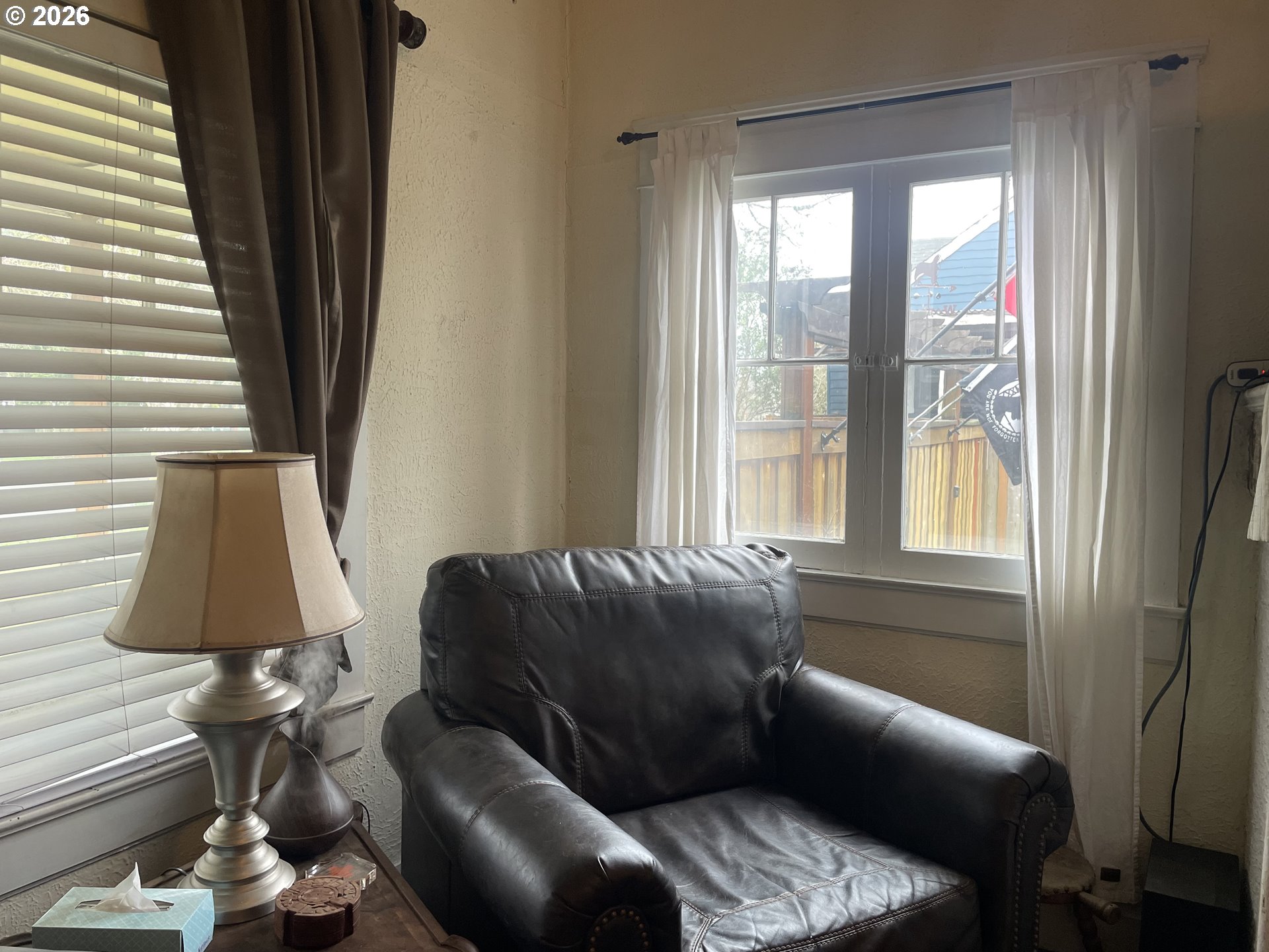 1006 5th Street Springfield, OR 97477 - Photo 7 of 43 a living room with furniture and a window