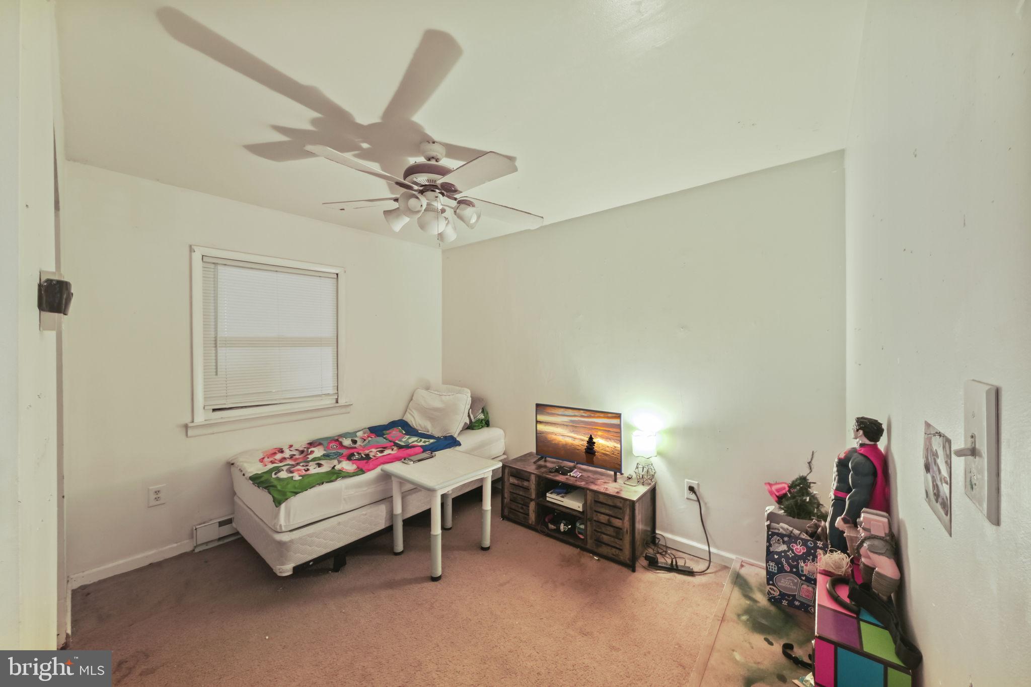 335 Bells Drive Warsaw, VA 22572 - Photo 4 of 11 a bedroom with furniture and a bed