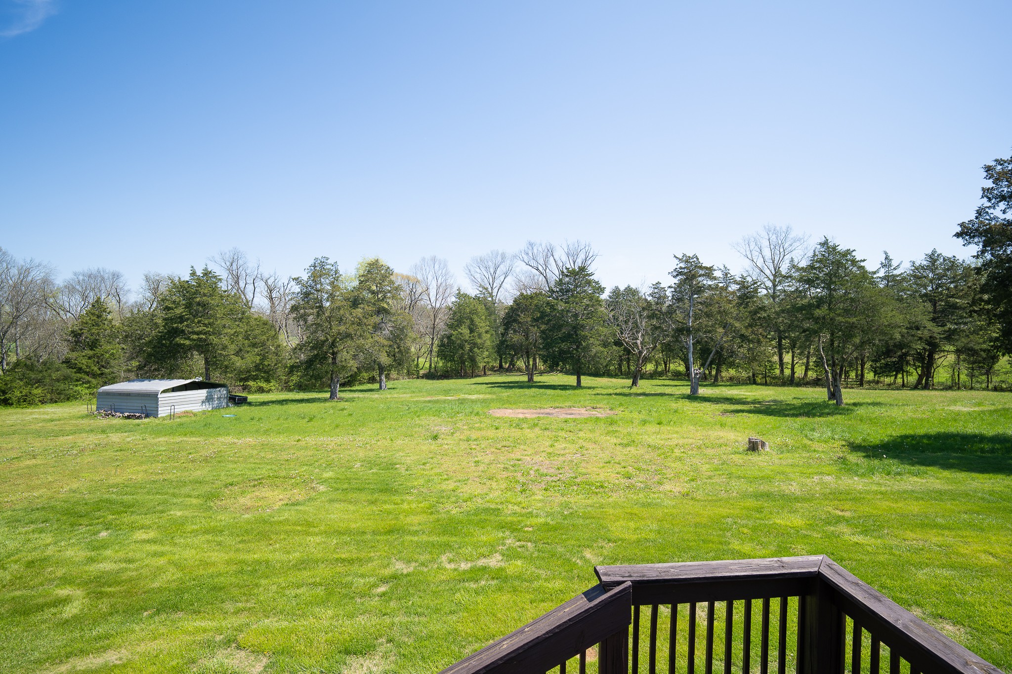 4081 South Commerce Road Watertown, TN 37184 - Photo 15 of 18 a view of a golf course with a lake