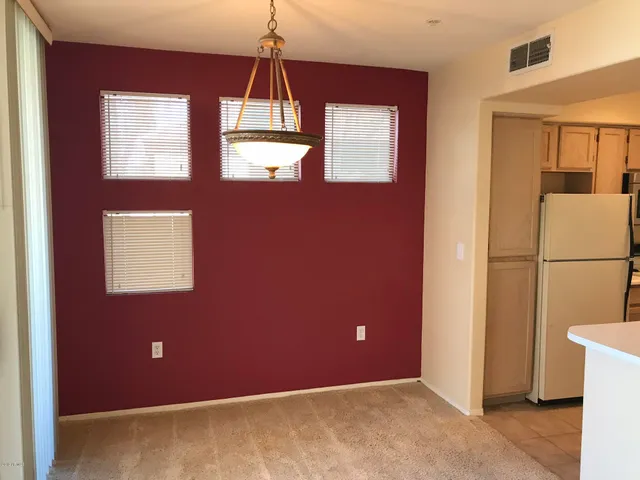 a view of livingroom with furniture and windows
