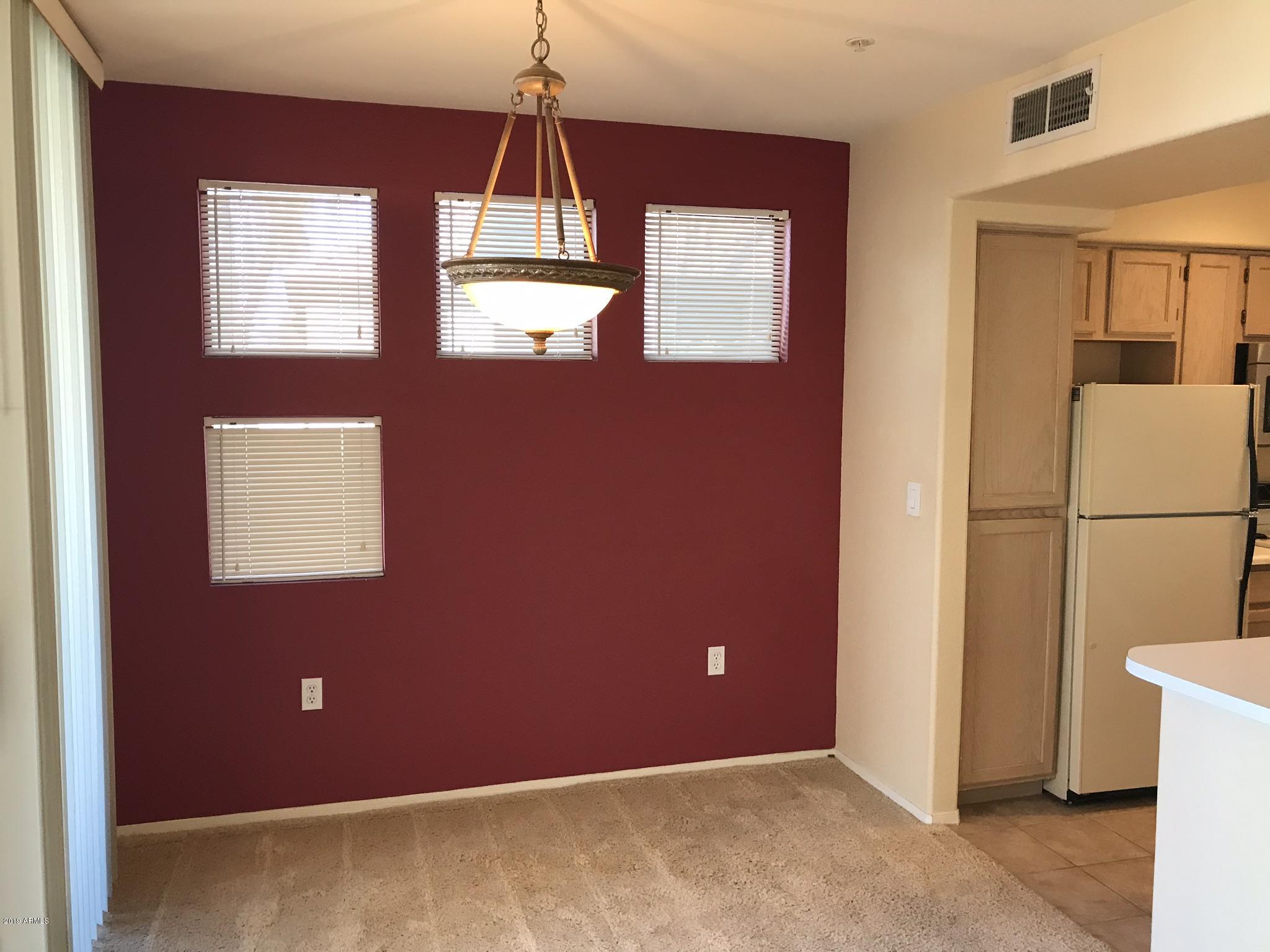 3848 North 3rd Avenue, Unit 2046 Phoenix, AZ 85013 - Photo 14 of 25 a view of livingroom with furniture and windows