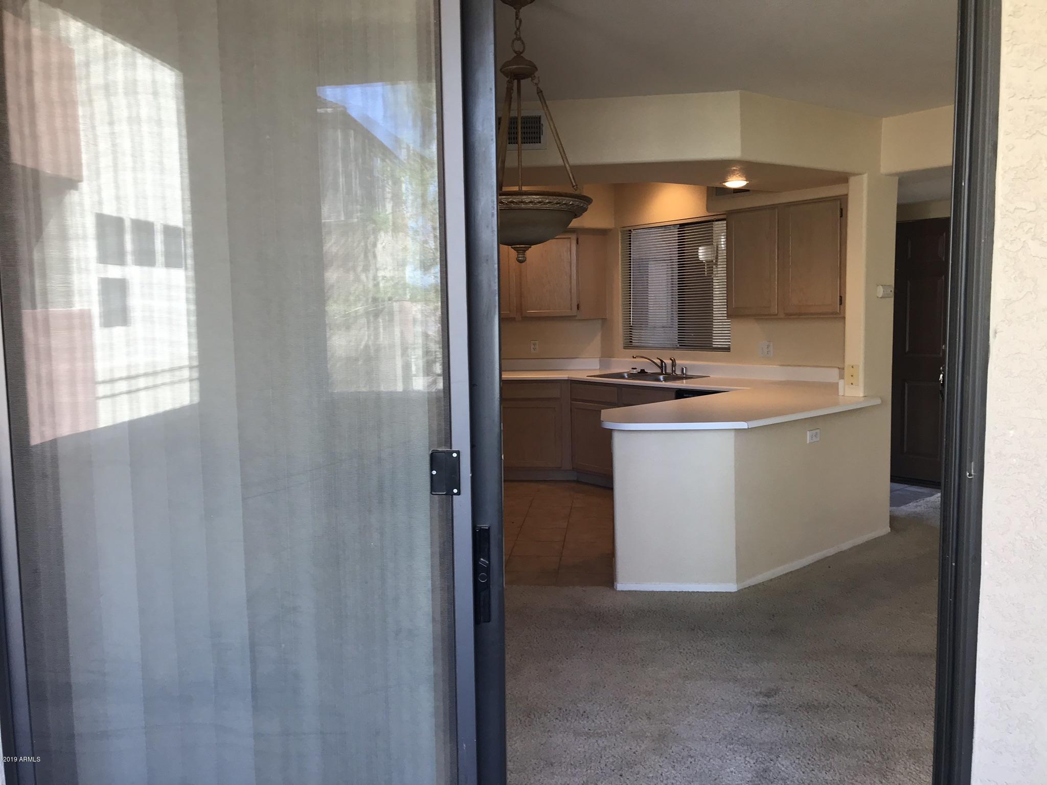 3848 North 3rd Avenue, Unit 2046 Phoenix, AZ 85013 - Photo 22 of 25 a view of a bathroom with a sink and mirror