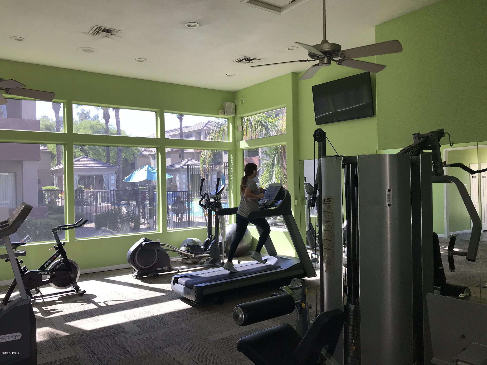 3848 North 3rd Avenue, Unit 2046 Phoenix, AZ 85013 - Photo 4 of 25 a view of a room with gym equipment