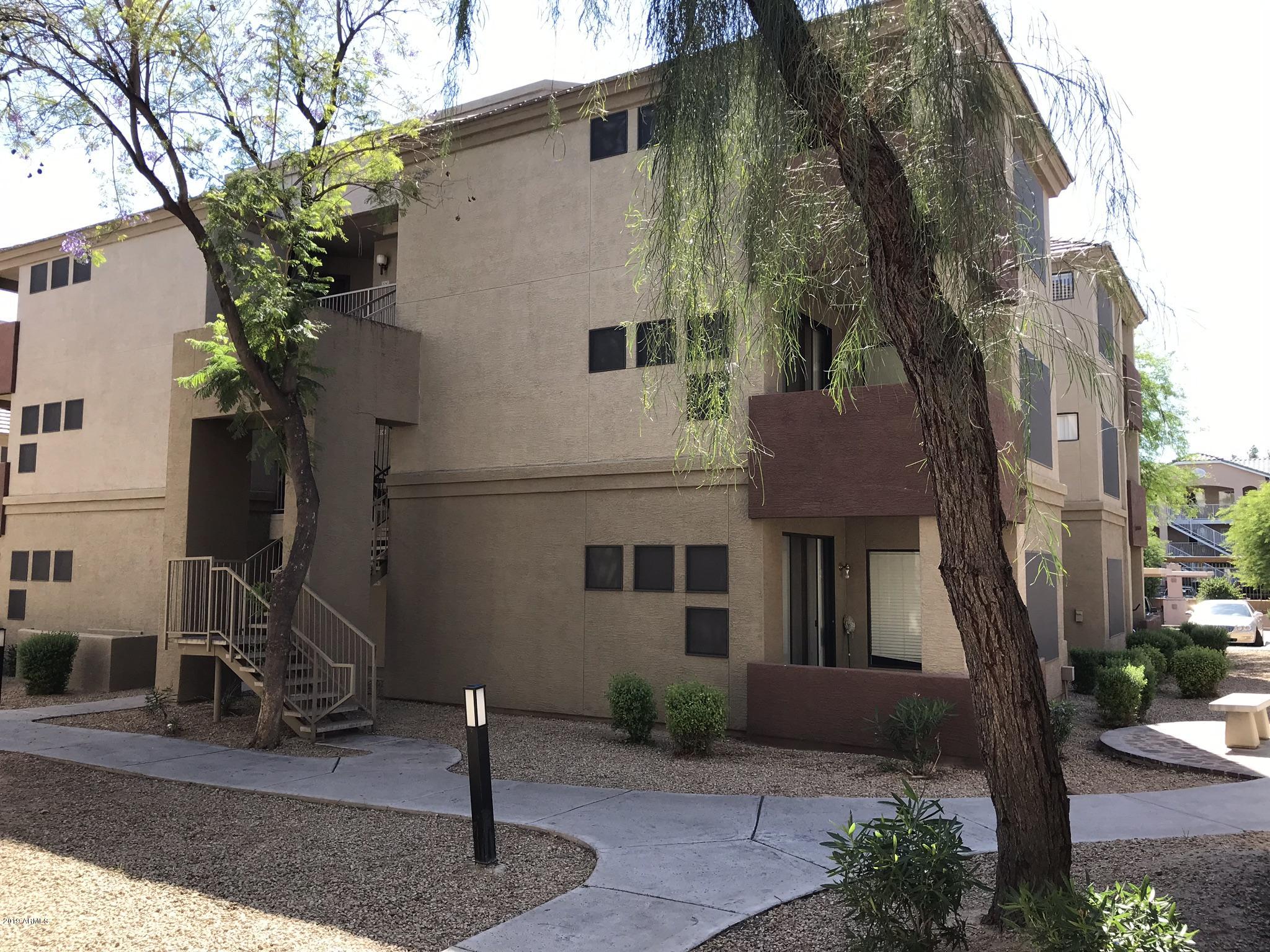 3848 North 3rd Avenue, Unit 2046 Phoenix, AZ 85013 - Photo 10 of 25 a front view of a house with garden