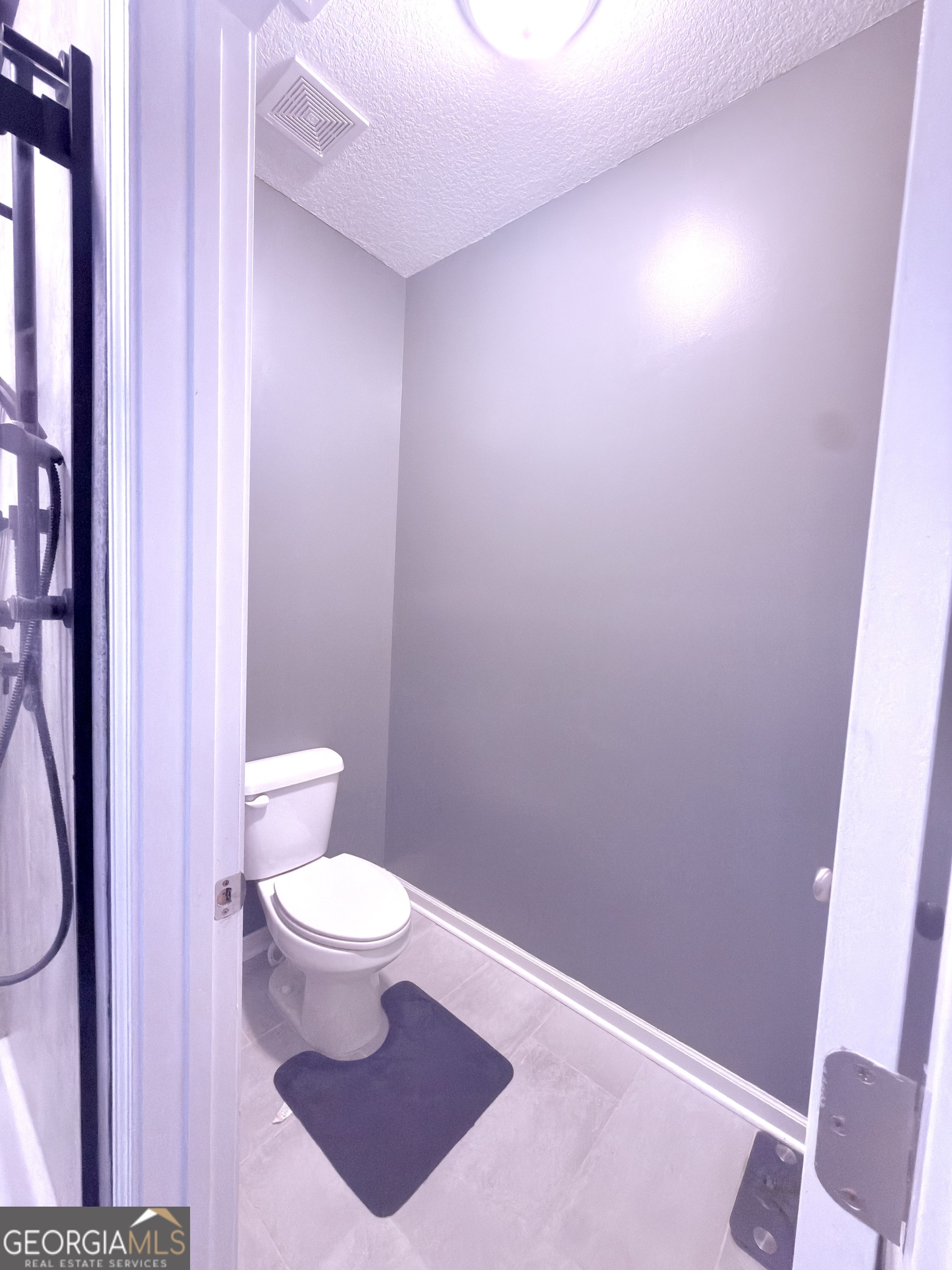 1615 Colony Lane Brooklet, GA 30415 - Photo 28 of 36 a bathroom with a toilet and a sink