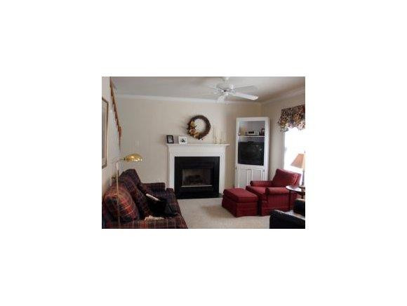 1220 Hanford Hills Road Graham, NC 27253 - Photo 12 of 24 a living room with furniture and a fireplace