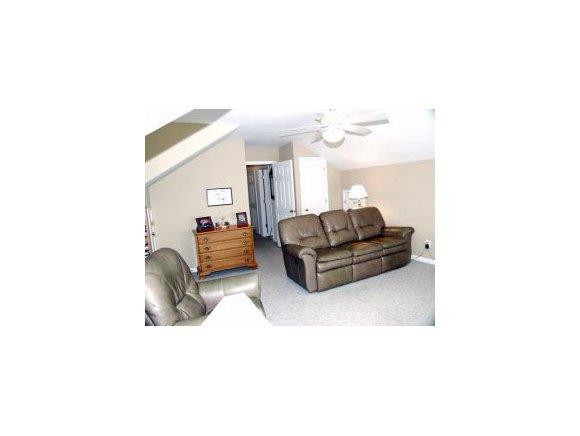 1220 Hanford Hills Road Graham, NC 27253 - Photo 18 of 24 a living room with furniture and a lamp