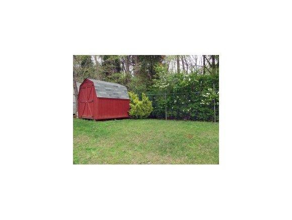 1220 Hanford Hills Road Graham, NC 27253 - Photo 24 of 24 a picture of a bench in a backyard