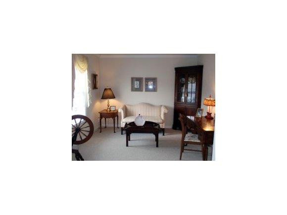 1220 Hanford Hills Road Graham, NC 27253 - Photo 6 of 24 a living room with furniture and a window