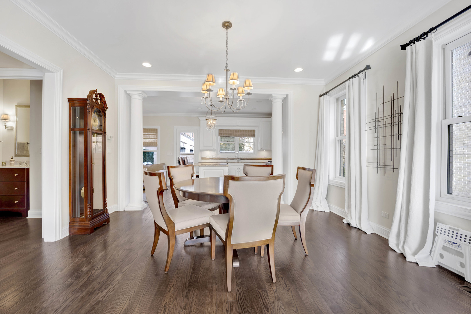 460 Pennsylvania Avenue, Unit C Glen Ellyn, IL 60137 - Photo 8 of 37 a view of a dining room with furniture window and wooden floor