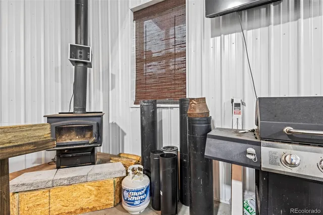 a kitchen with a stove and a refrigerator
