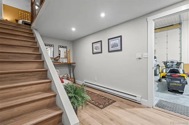 a view of staircase with wooden floor and stairs