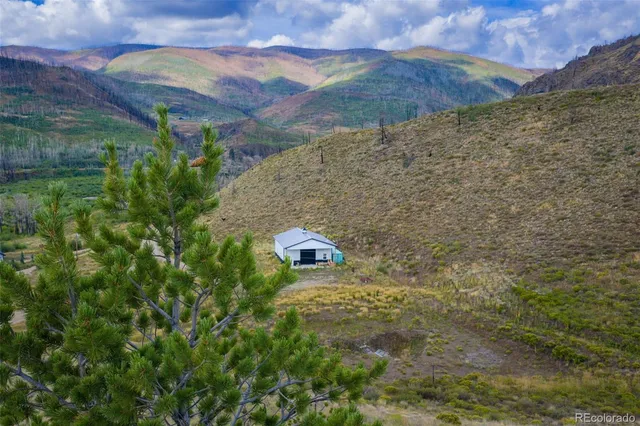a view of a yard with an outdoor space