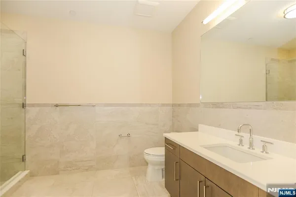 a bathroom with a bathtub and a sink