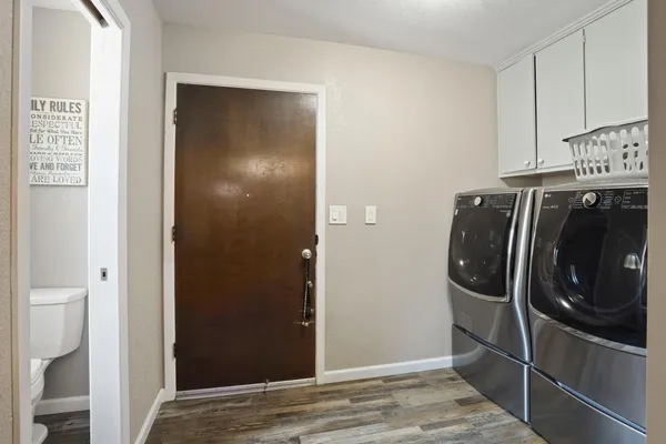 a view of a refrigerator in kitchen