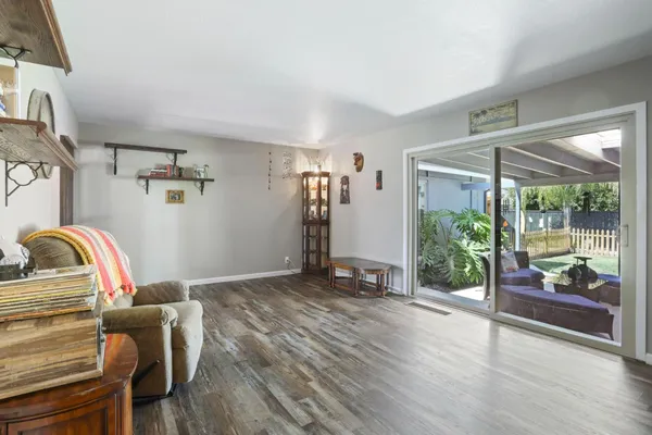 a view of livingroom with furniture and floor to ceiling window