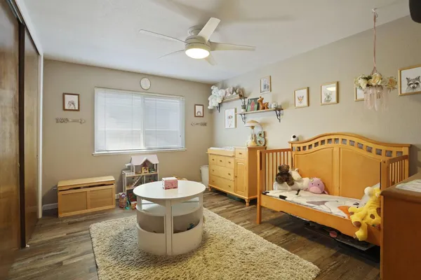 a living room with furniture and a table