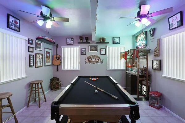 a room with furniture and chandelier