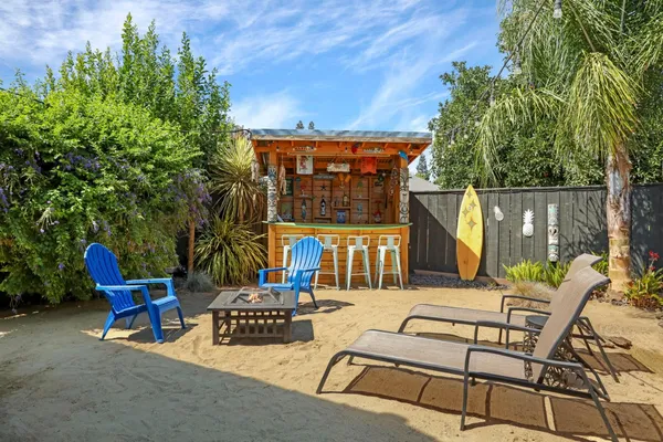 an outdoor space with patio furniture