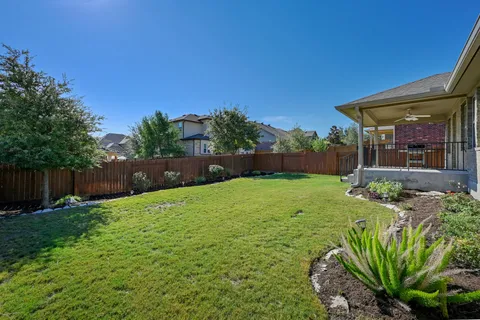 a view of a backyard with a garden