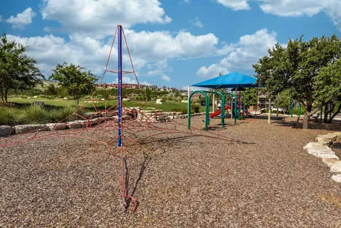 a view of a park with swings on the wall
