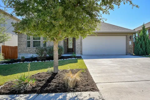 a front view of house with yard