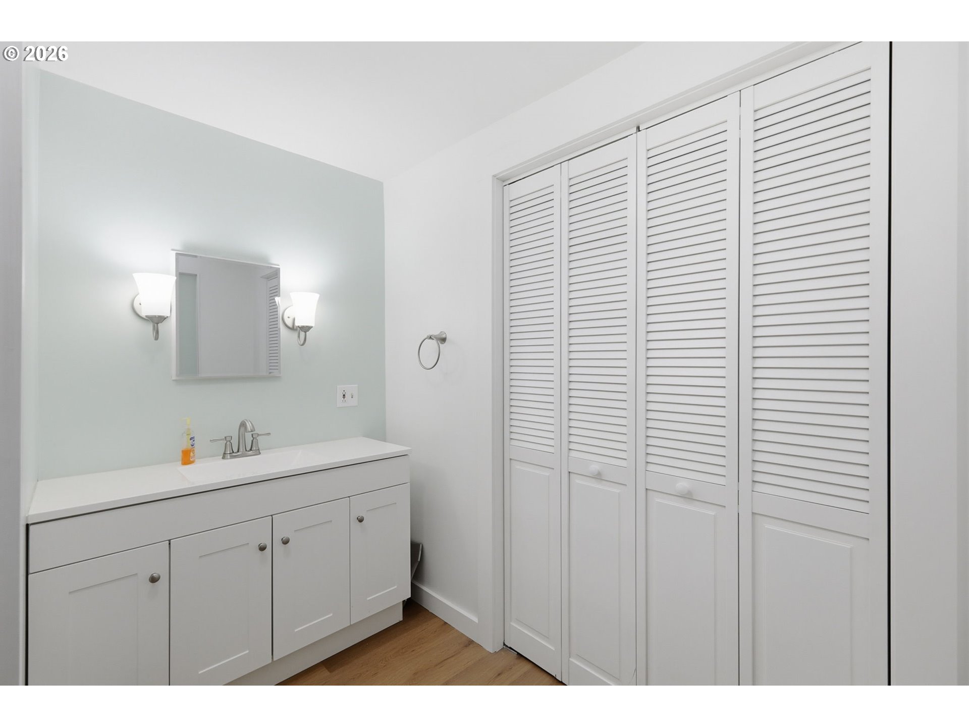 1600 Rhododendron Drive, Unit 76 Florence, OR 97439 - Photo 17 of 36 a bathroom with a sink and a mirror