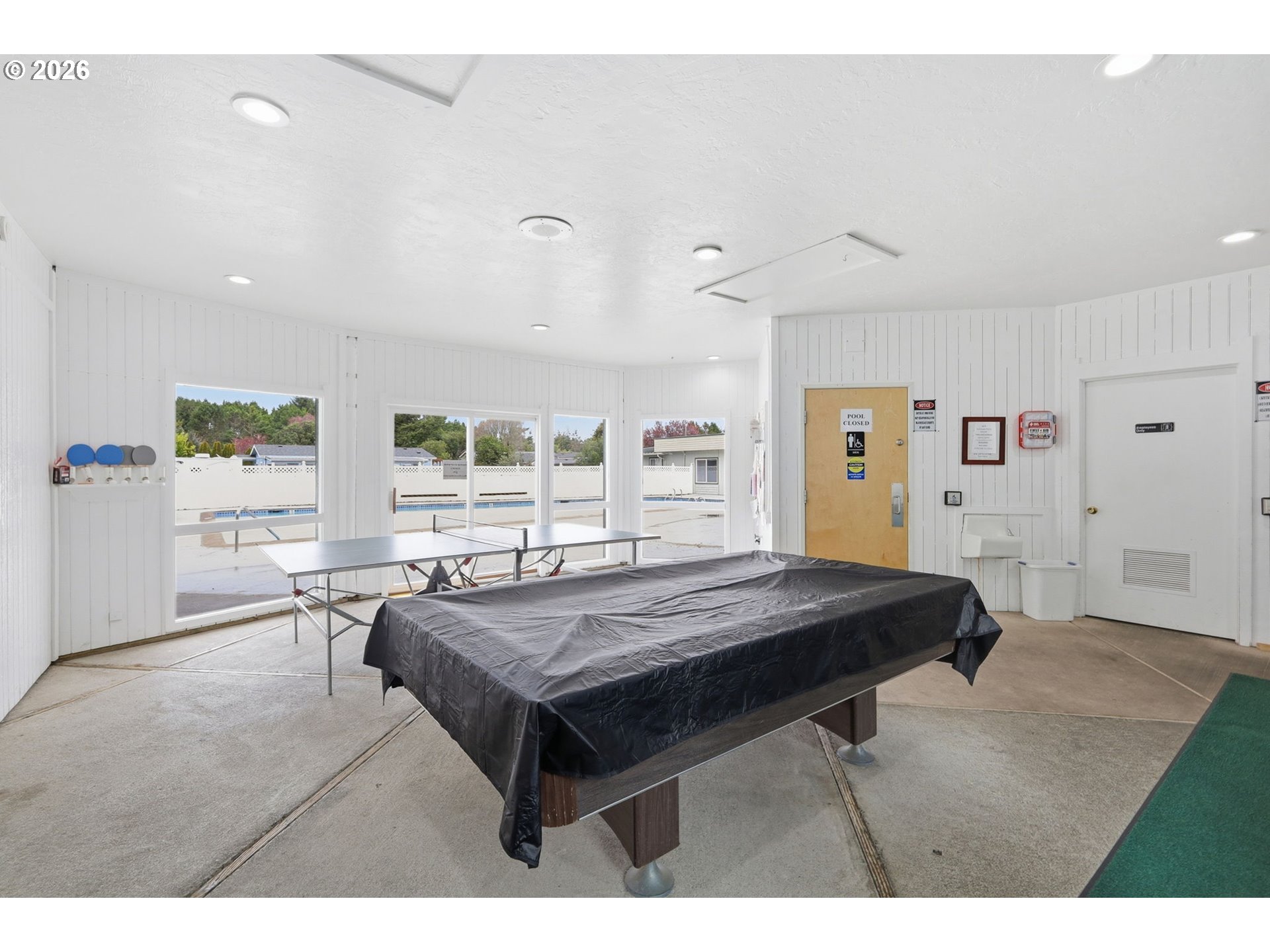 1600 Rhododendron Drive, Unit 76 Florence, OR 97439 - Photo 28 of 36 a room with furniture and window