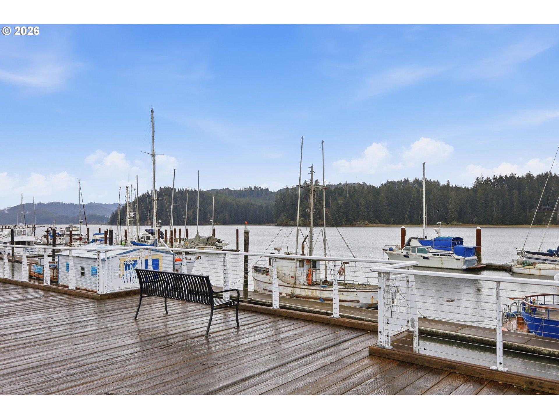 1600 Rhododendron Drive, Unit 76 Florence, OR 97439 - Photo 36 of 36 a view of living room filled with furniture and wooden floor