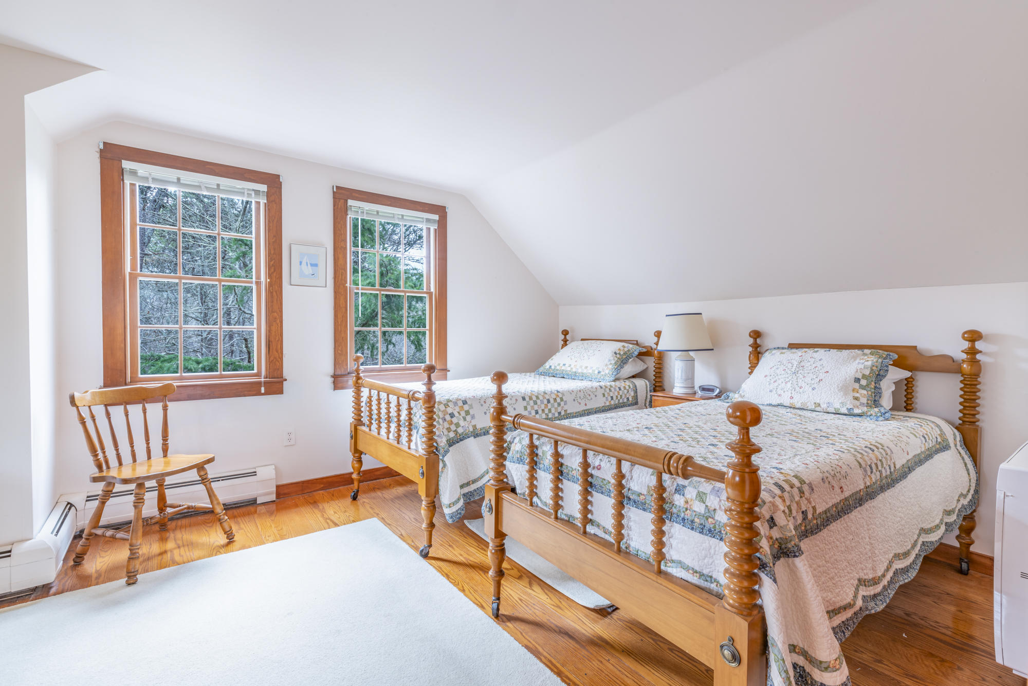138 Namequoit Road Orleans, MA 02653 - Photo 17 of 50 a bedroom with a bed and a window